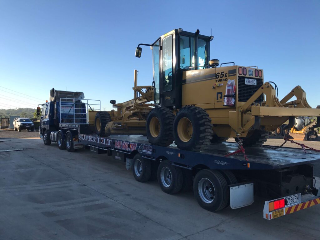 Transporting Grader